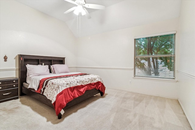 bedroom featuring lofted ceiling, ceiling fan, and carpet floors