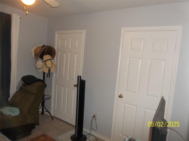bedroom with light tile patterned floors