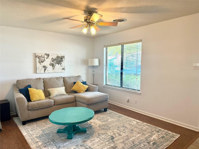 152 N Imperial Dr, Denison, TX 75020 - living area with a ceiling fan and wood finished floors