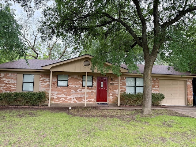 152 N Imperial Dr, Denison, TX 75020 - ranch-style house with an attached garage, brick siding, a front lawn, and driveway