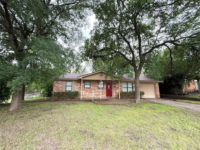 152 N Imperial Dr, Denison, TX 75020 - single story home featuring driveway, brick siding, a garage, and a front lawn
