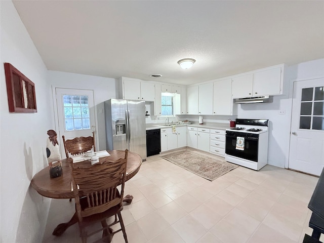 152 N Imperial Dr, Denison, TX 75020 - kitchen featuring white gas stove, stainless steel refrigerator with ice dispenser, under cabinet range hood, dishwasher, and light countertops