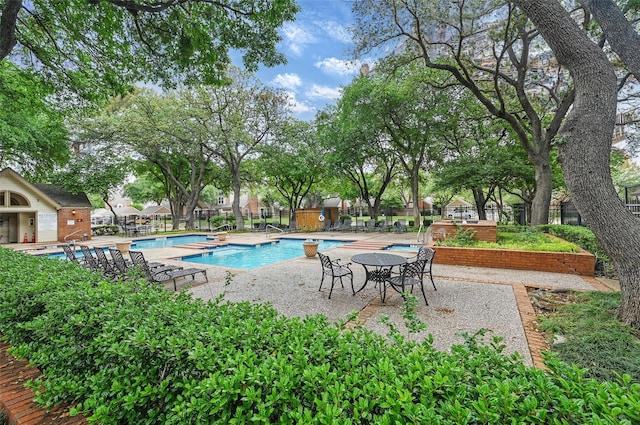 pool featuring fence