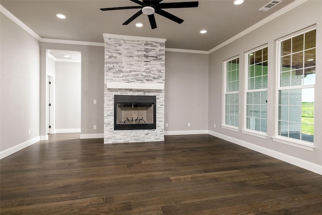 7196 Hawkeye Rd, Krum, TX 76249 - unfurnished living room featuring visible vents, dark wood-style flooring, a ceiling fan, and a fireplace
