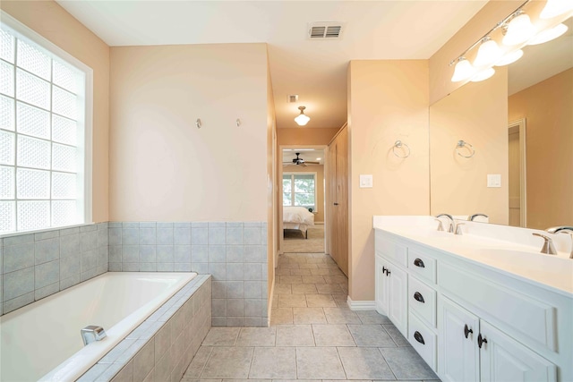 full bath featuring a sink, double vanity, ensuite bathroom, and visible vents