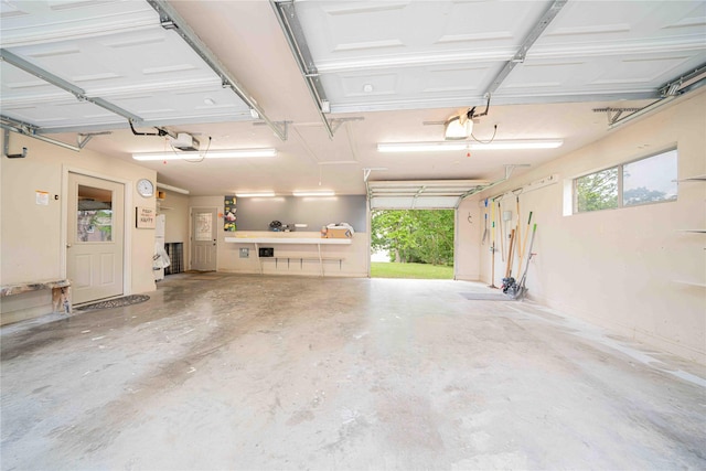 garage featuring a garage door opener