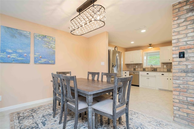 dining area with baseboards, recessed lighting, and visible vents