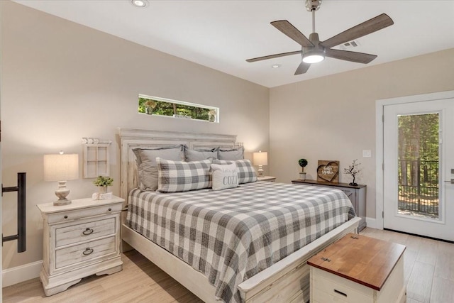 10 Holland St, Pottsboro, TX 75076 - bedroom featuring access to exterior, multiple windows, light wood-style floors, baseboards, and recessed lighting