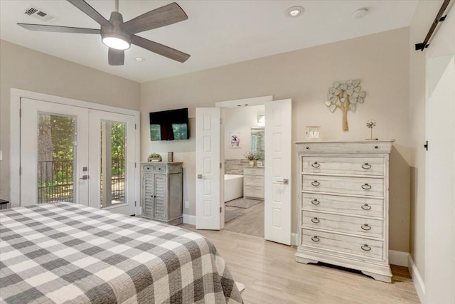 10 Holland St, Pottsboro, TX 75076 - bedroom featuring access to outside, light wood-type flooring, french doors, connected bathroom, and baseboards
