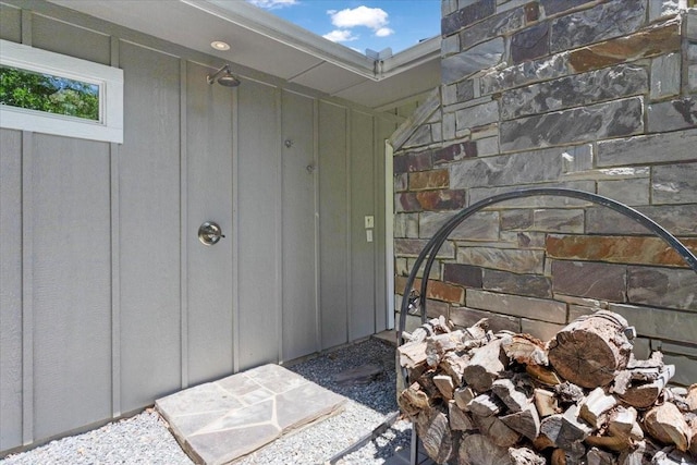 10 Holland St, Pottsboro, TX 75076 - property entrance featuring board and batten siding