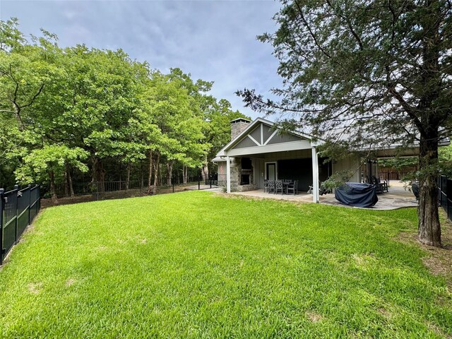 10 Holland St, Pottsboro, TX 75076 - view of yard with a patio