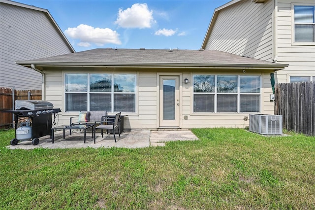 7512 Lazy Spur Blvd, Fort Worth, TX 76131 - back of property featuring a patio, central air condition unit, an outdoor hangout area, and a shingled roof