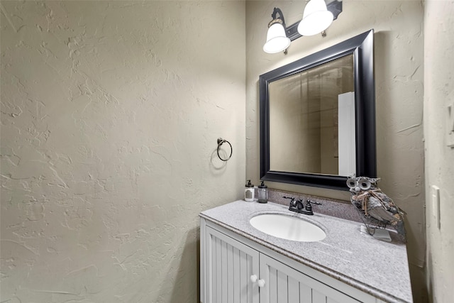 10528 Lago Vis, Quinlan, TX 75474 - bathroom with vanity and a textured wall