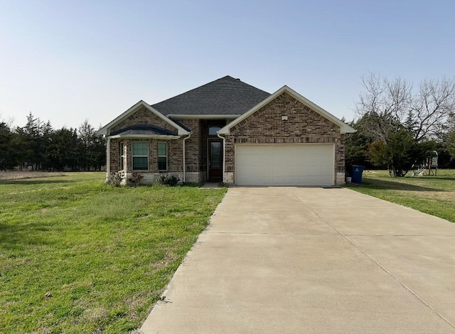 view of front of home featuring brick siding, concrete driveway, a garage, a front yard, and a shingled roof