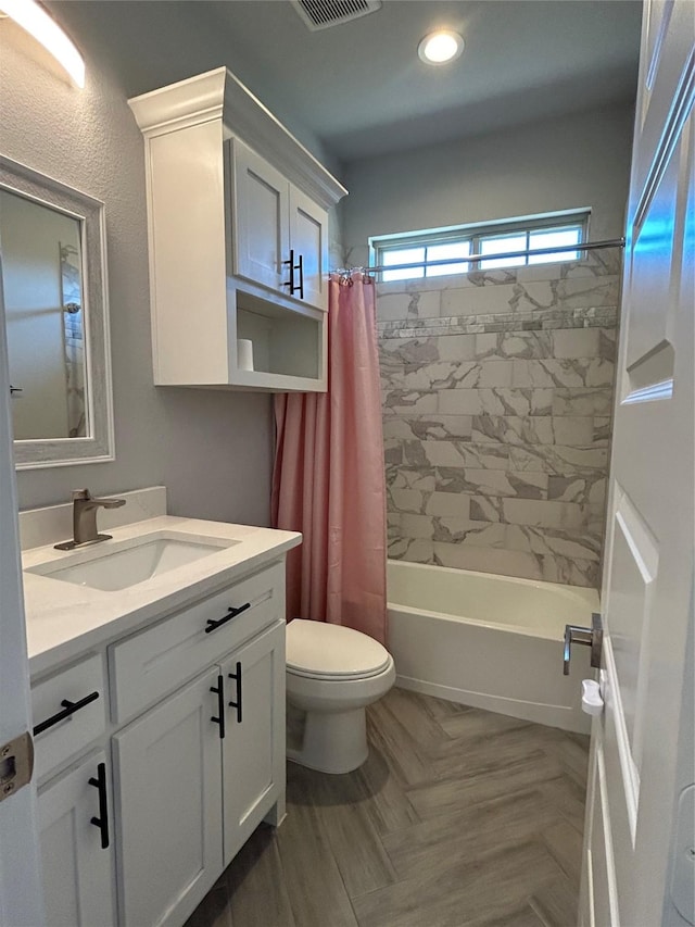 bathroom with recessed lighting, shower / bath combo with shower curtain, toilet, visible vents, and vanity