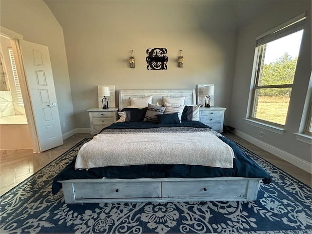 bedroom featuring baseboards