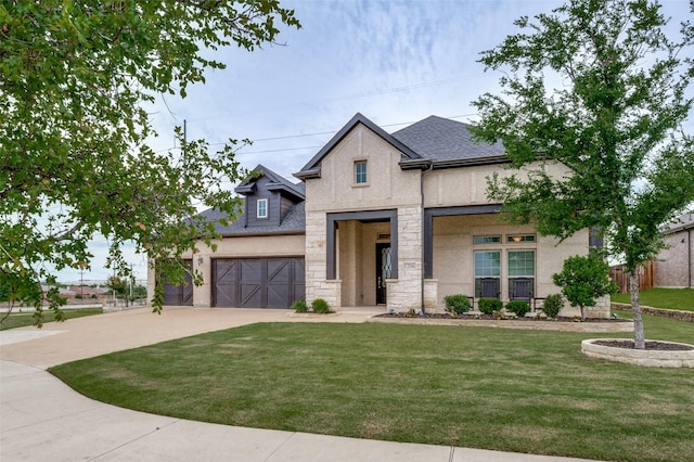 view of front facade featuring stone siding, concrete driveway, stucco siding, a front lawn, and a shingled roof