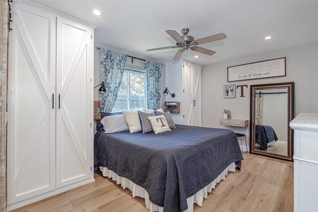 509 Oak St, Burleson, TX 76028 - bedroom featuring light wood-style floors, recessed lighting, and a ceiling fan