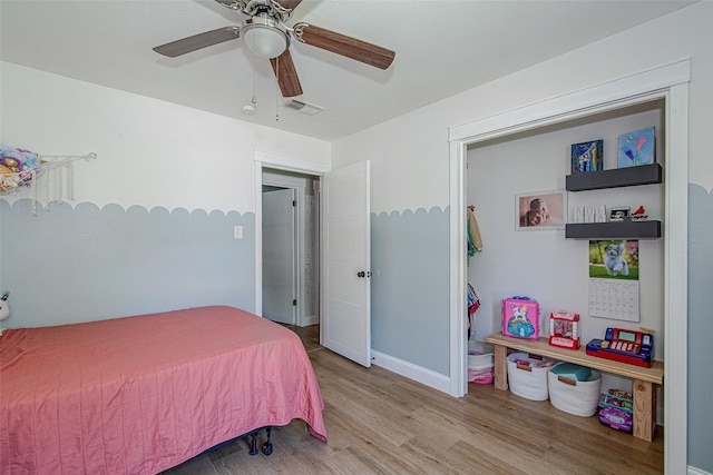 509 Oak St, Burleson, TX 76028 - bedroom featuring ceiling fan, baseboards, light wood-type flooring, and visible vents