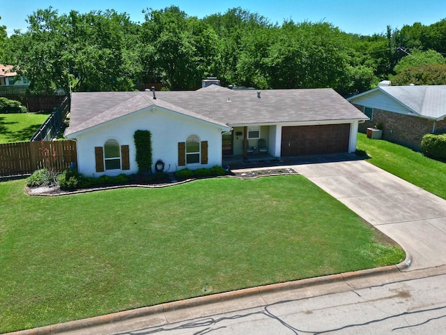 509 Oak St, Burleson, TX 76028 - ranch-style house with a front lawn, driveway, an attached garage, and fence