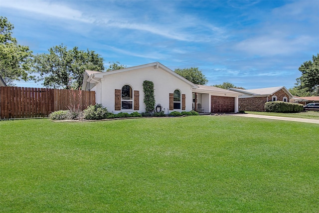 509 Oak St, Burleson, TX 76028 - ranch-style home with an attached garage, stucco siding, fence, concrete driveway, and a front yard