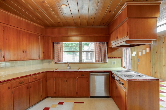 2000 Standifer St, Fort Worth, TX 76164 - kitchen featuring a sink, light floors, tile countertops, wood ceiling, and appliances with stainless steel finishes