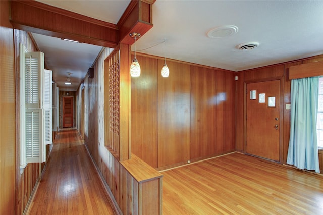 2000 Standifer St, Fort Worth, TX 76164 - entryway with wood walls, wood finished floors, and visible vents