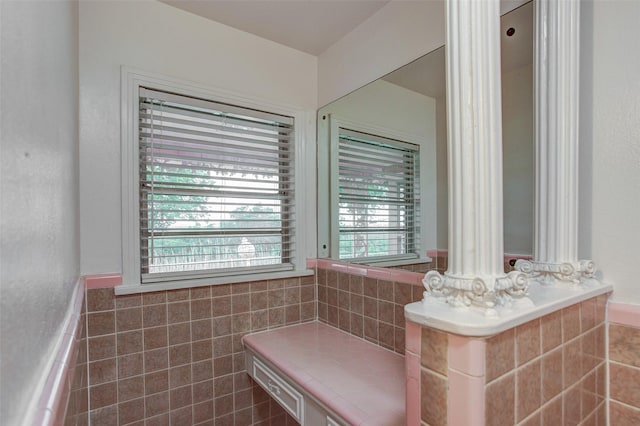 2000 Standifer St, Fort Worth, TX 76164 - bathroom with tile walls and a wainscoted wall