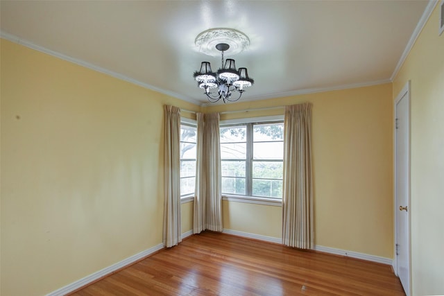 2000 Standifer St, Fort Worth, TX 76164 - interior space featuring baseboards, visible vents, crown molding, light wood-style flooring, and a notable chandelier