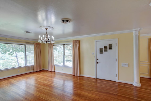 2000 Standifer St, Fort Worth, TX 76164 - interior space with baseboards, a notable chandelier, light wood-style floors, and a wealth of natural light