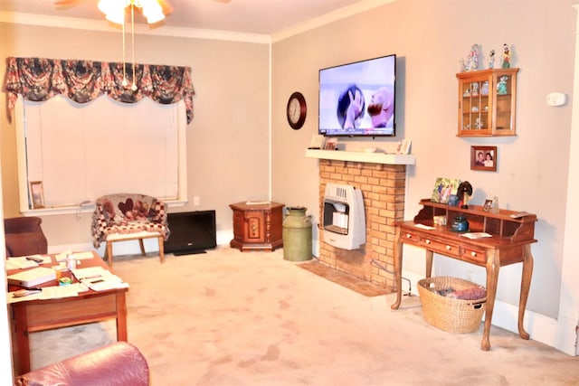 living area featuring ornamental molding, carpet, and a ceiling fan