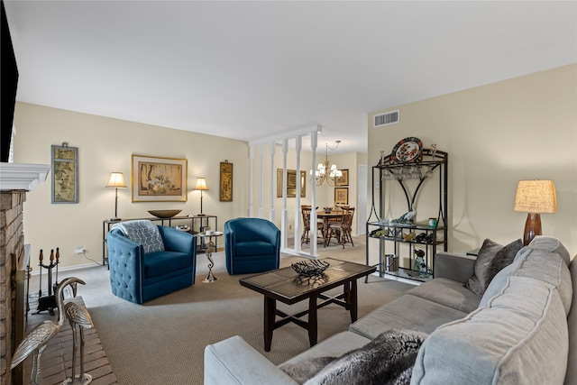 carpeted living room featuring a fireplace, a chandelier, and visible vents