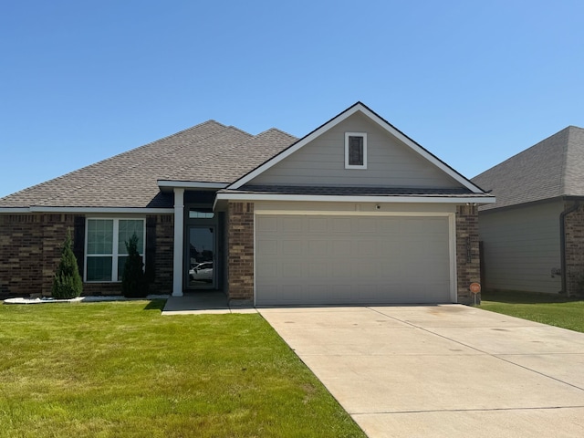 view of front of home with concrete driveway, a front lawn, and brick siding