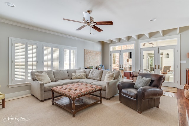 4126 Richmond Ave, Shreveport, LA 71106 - living room featuring french doors, ornamental molding, light wood-type flooring, a ceiling fan, and baseboards
