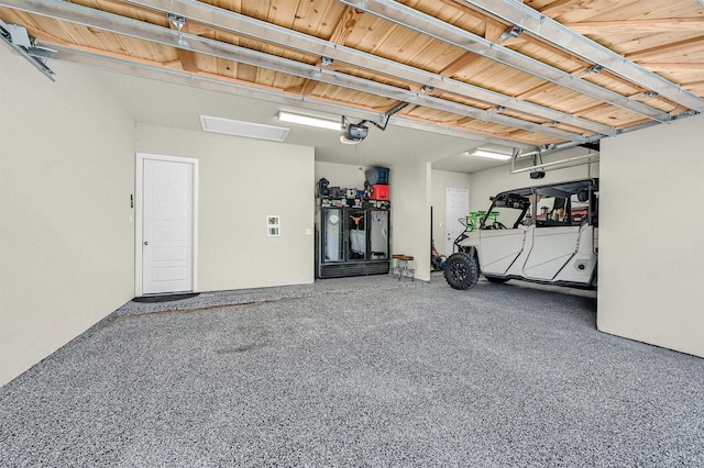 1504 Bearpath Way, Gunter, TX 75058 - garage featuring a garage door opener