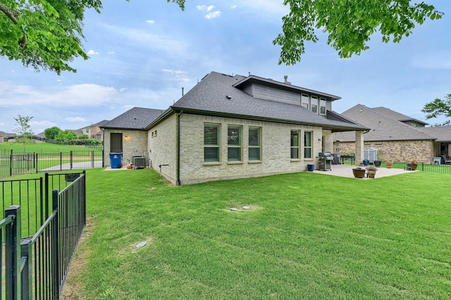 1504 Bearpath Way, Gunter, TX 75058 - rear view of house featuring a patio, a shingled roof, a fenced backyard, and brick siding