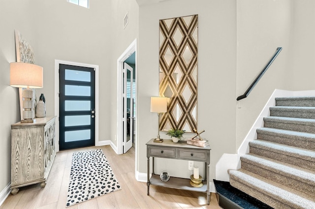 1504 Bearpath Way, Gunter, TX 75058 - entrance foyer with stairs, light wood-style flooring, and a high ceiling