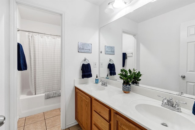 full bath with tile patterned flooring, double vanity, a sink, and shower / bath combo with shower curtain