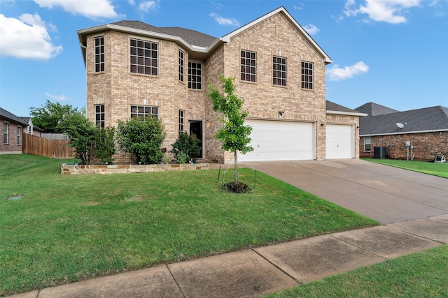 221 Brookdale Dr, Midlothian, TX 76065 - view of front of property with concrete driveway, brick siding, central AC, and an attached garage