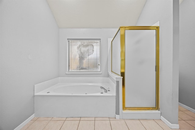 609 S Ruidoso Downs Dr, Robinson, TX 76706 - full bathroom with tile patterned flooring, lofted ceiling, a shower stall, and a bath