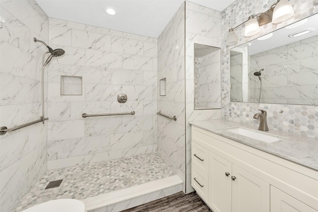 10110 Andre Dr, Irving, TX 75063 - bathroom with toilet, vanity, recessed lighting, decorative backsplash, and tiled shower