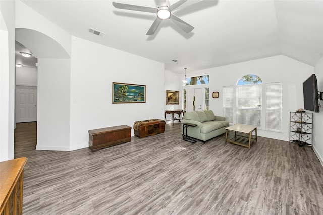 10110 Andre Dr, Irving, TX 75063 - sitting room featuring wood finished floors, visible vents, ceiling fan, arched walkways, and baseboards