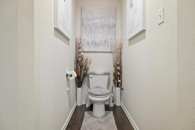 113 Clason Rd, Royse City, TX 75189 - bathroom featuring toilet, baseboards, and wood finished floors