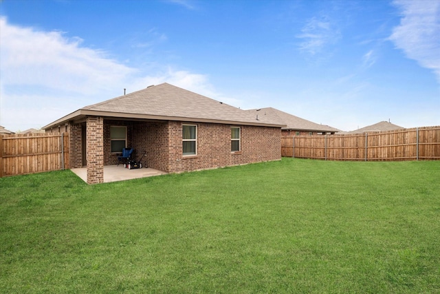 113 Clason Rd, Royse City, TX 75189 - rear view of property featuring a patio, brick siding, and a shingled roof