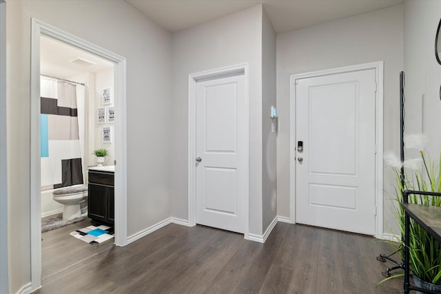 113 Clason Rd, Royse City, TX 75189 - entrance foyer with dark wood-style flooring and baseboards