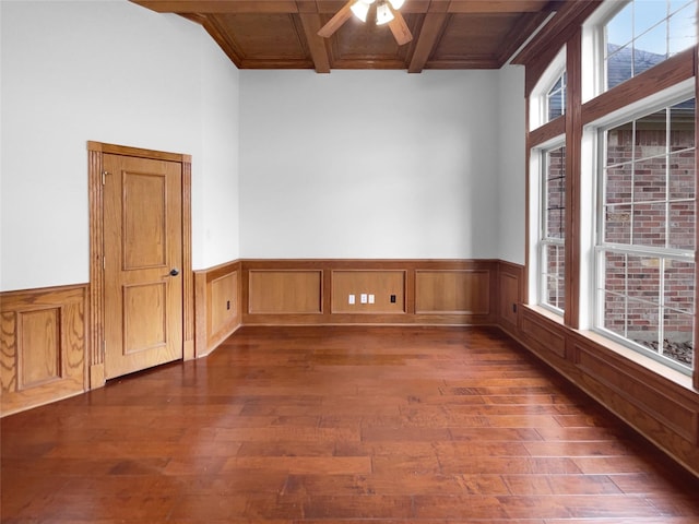 8280 St Johns Dr, Waxahachie, TX 75167 - spare room featuring wainscoting, beam ceiling, a ceiling fan, and dark wood finished floors