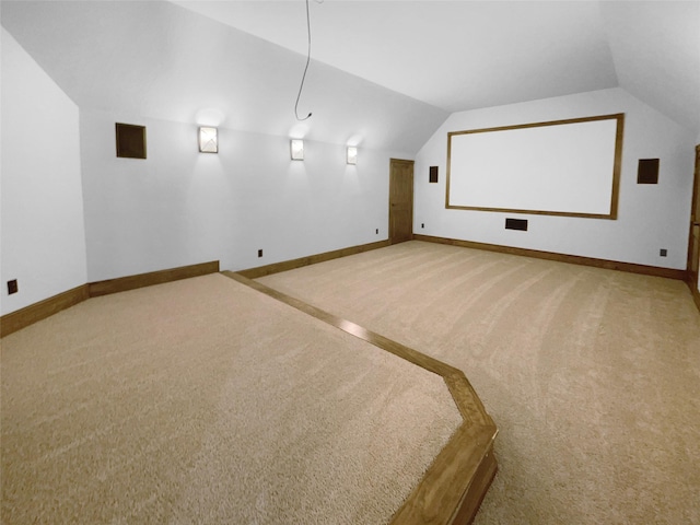 8280 St Johns Dr, Waxahachie, TX 75167 - cinema room with carpet, baseboards, and lofted ceiling