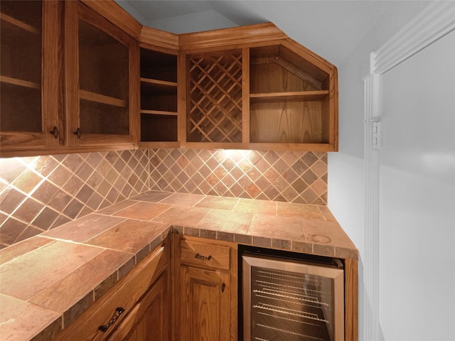 8280 St Johns Dr, Waxahachie, TX 75167 - kitchen featuring lofted ceiling, tasteful backsplash, open shelves, and beverage cooler