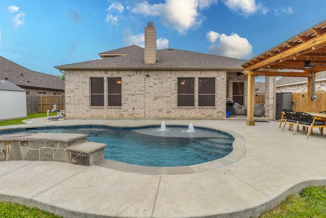 view of swimming pool with a patio, a fenced in pool, a ceiling fan, and a fenced backyard