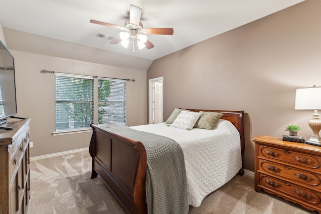 bedroom featuring visible vents, vaulted ceiling, carpet flooring, a ceiling fan, and baseboards